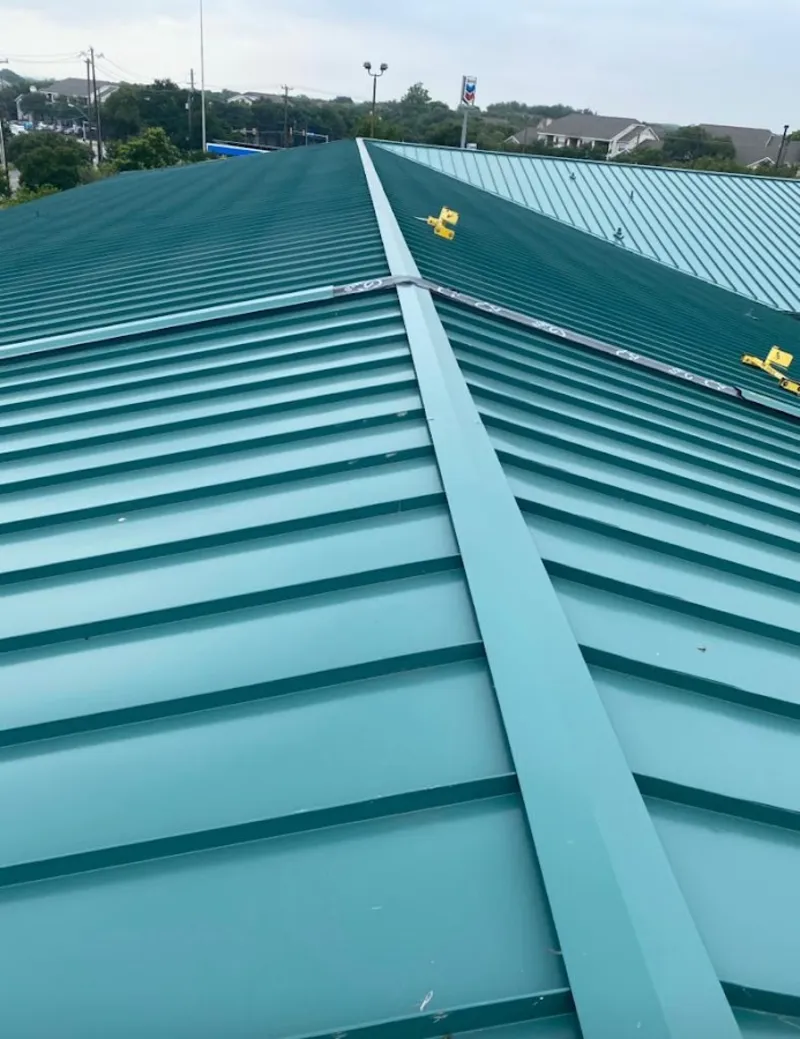 Green commercial metal roof ridge and valley for Metal Roof Repair in Morrisville