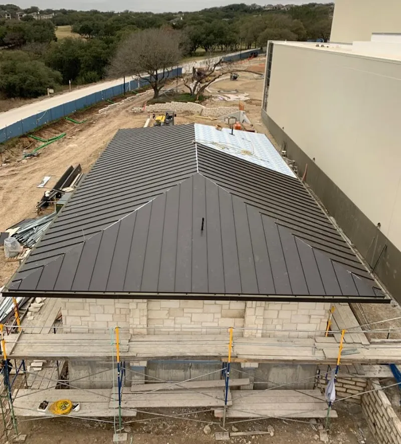 Metal roof new construction with scaffolding in Morrisville